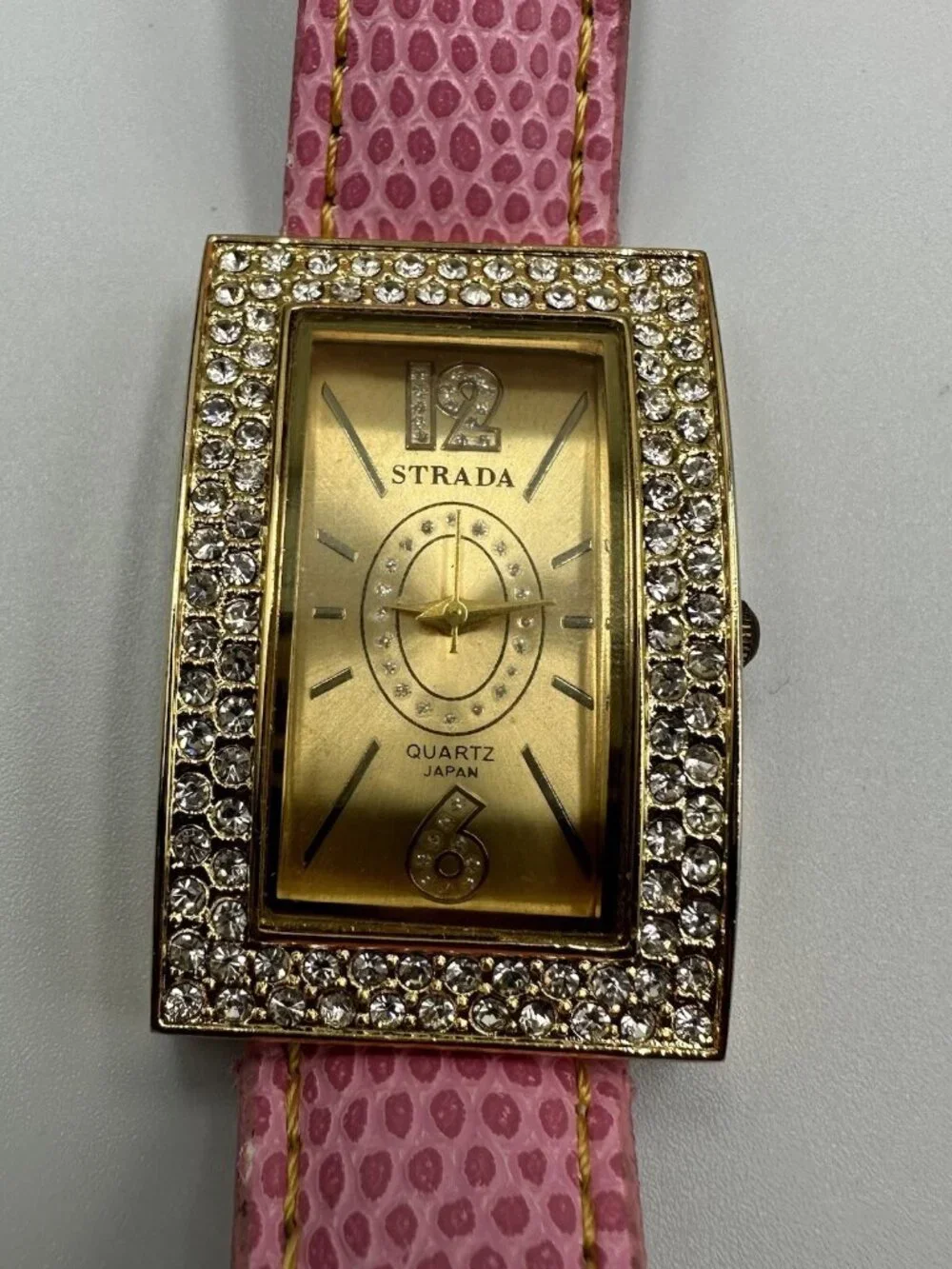 3/$30 Strada Watch Women Gold Tone Pink Faux Band Crystal Bling Bezel 9”
